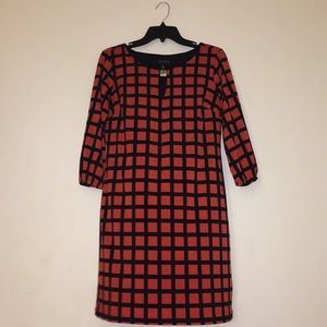 Red and black cage dress